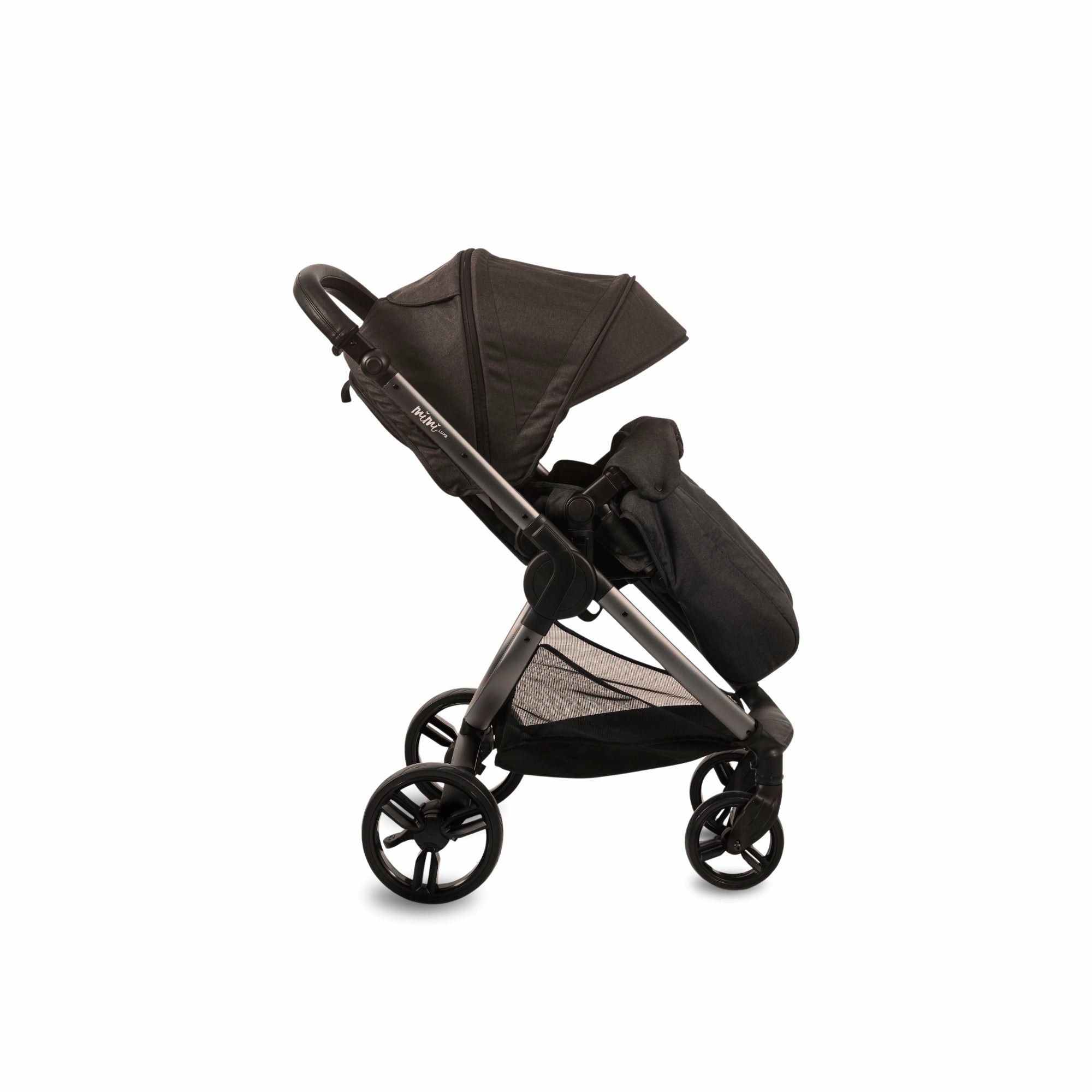 Mimi Universal Foot Cover in black attached to a stroller seat