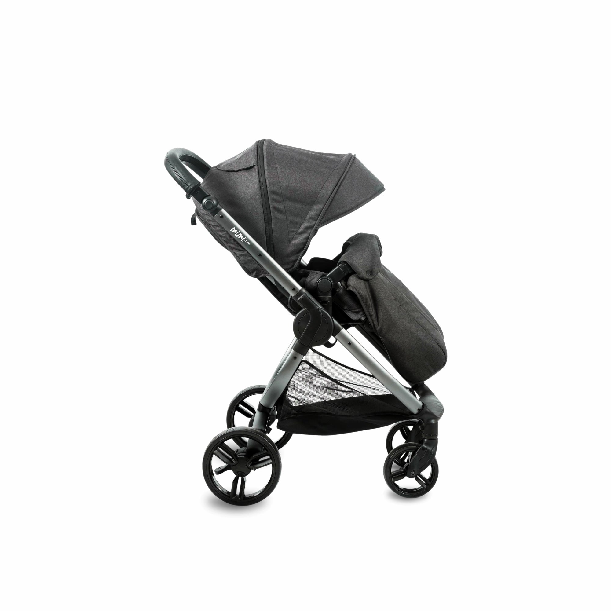 Black Mimi Universal Foot Cover shown on a stroller seat from the side